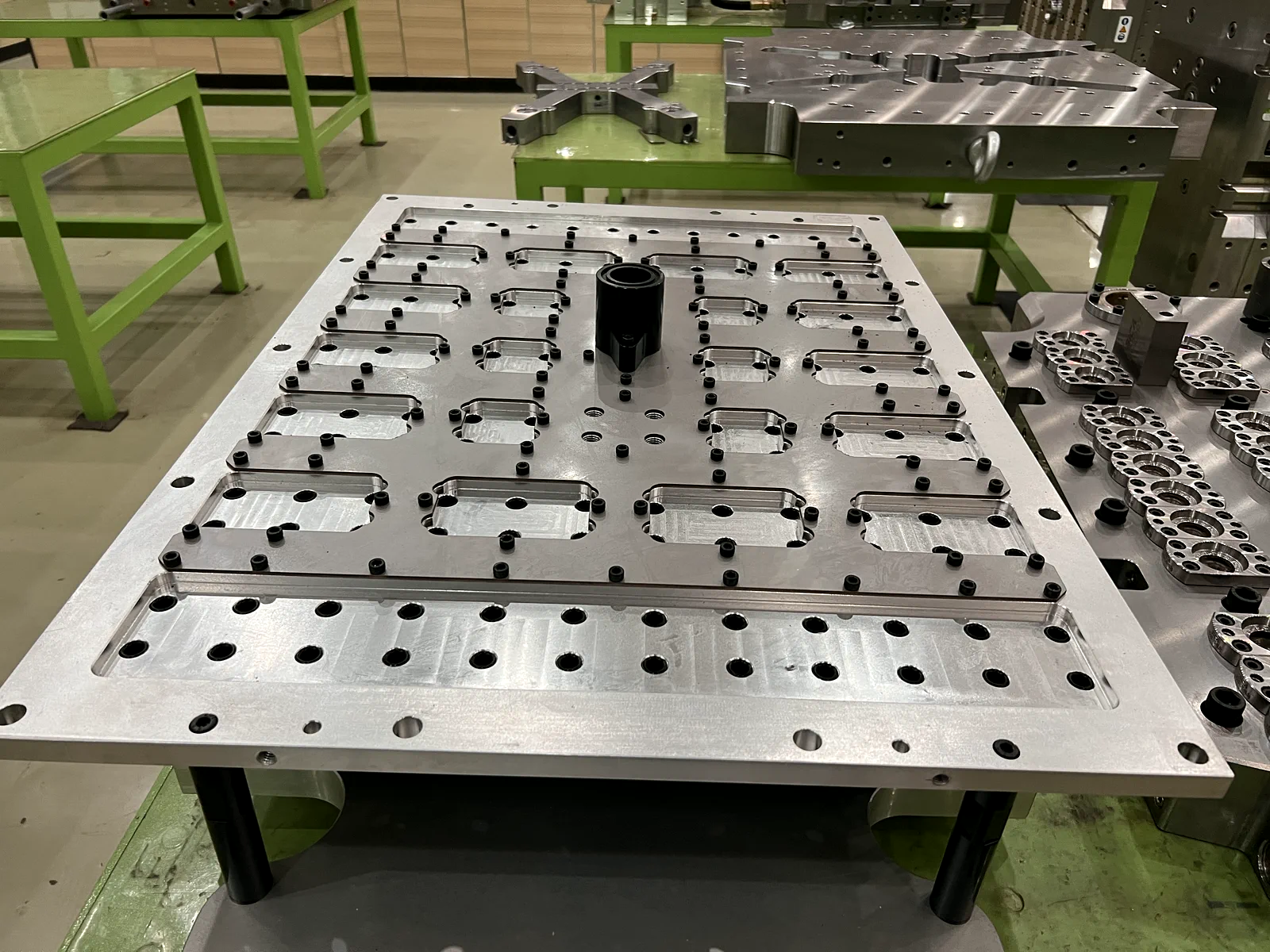 PET preform mold manifold plate during workshop assembly