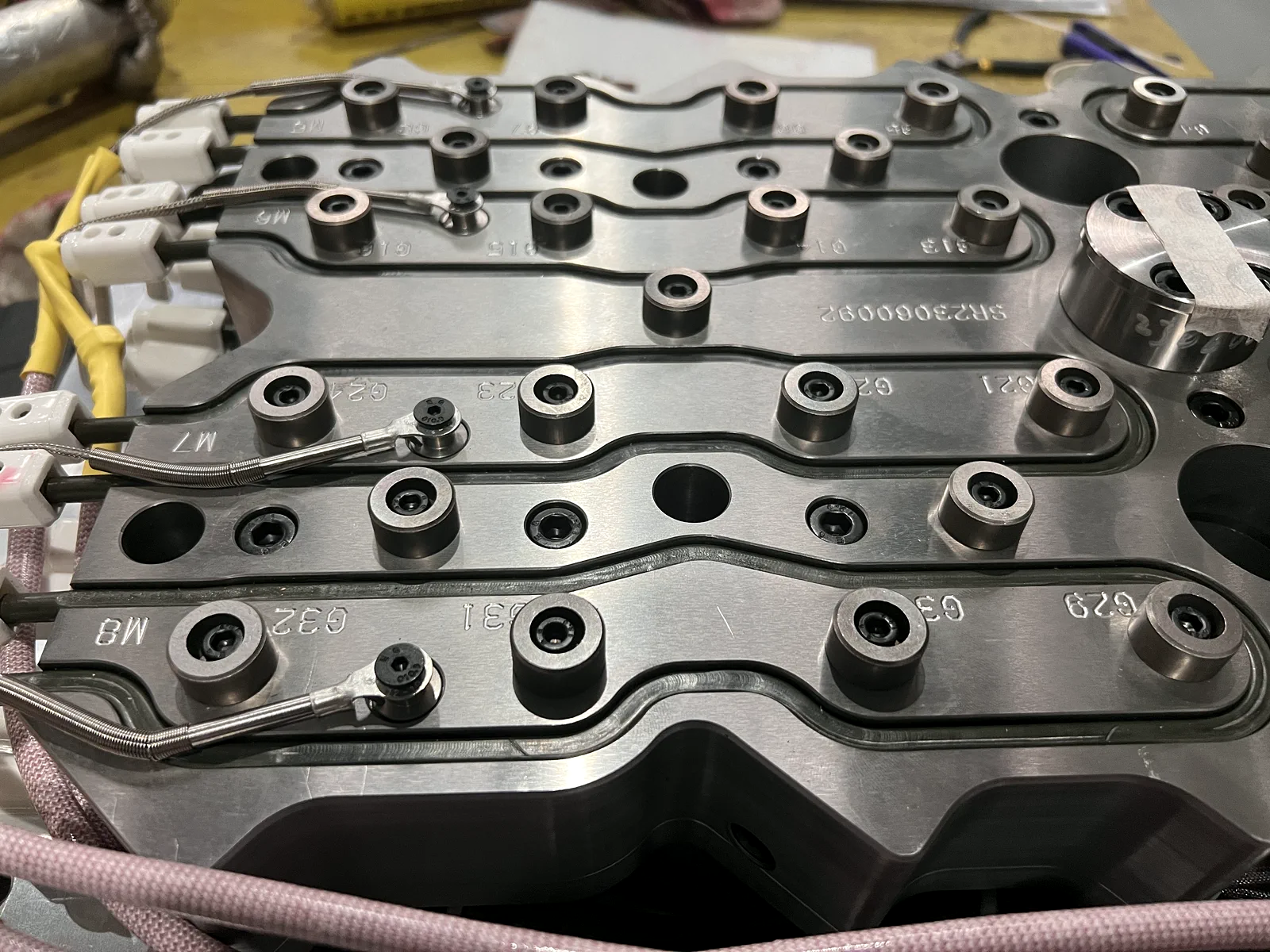 PET preform mold hot-runner manifold with heaters and wiring